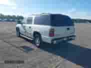 2003 Chevrolet Suburban LT z VIN 1GNEC16ZX3J197984, wystawiony jako IAAI lot #42606954 z przebiegiem 182 435 mil mil oraz . Historia ofert i sprzedaży dostępna na DreamBid. Obrazek 3.