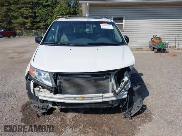 2012 Honda Odyssey Touring with VIN 5FNRL5H9XCB145597, listed as a IAAI auction lot 43247934 with 257,447 mi miles and . Bid and sale history available at DreamBid. Image 13.