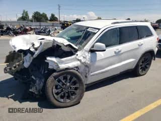 2016 Jeep Grand Cherokee 75th Anniversary with VIN 1C4RJFAG7GC470408, listed as a Copart auction lot 65464835 with 144,432 mi miles and Salvage title. Bid and sale history available at DreamBid. Image 1.