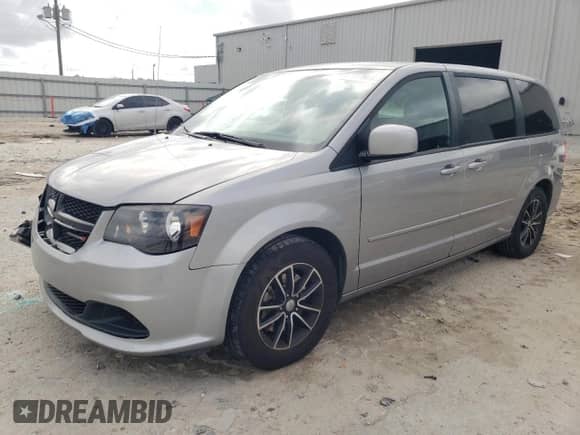 2015 Dodge Grand Caravan SE Plus with VIN 2C4RDGBG2FR737777, listed as a Copart auction lot 82349275 with 112,404 mi miles and Salvage title. Bid and sale history available at DreamBid. Image 1.