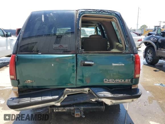 1998 Chevrolet Tahoe z VIN 1GNEC13R4WR131926, wystawiony jako Copart lot #61548494 z przebiegiem 354 592 mil mil oraz Szkoda całkowita • Salvage title. Historia ofert i sprzedaży dostępna na DreamBid. Obrazek 6.
