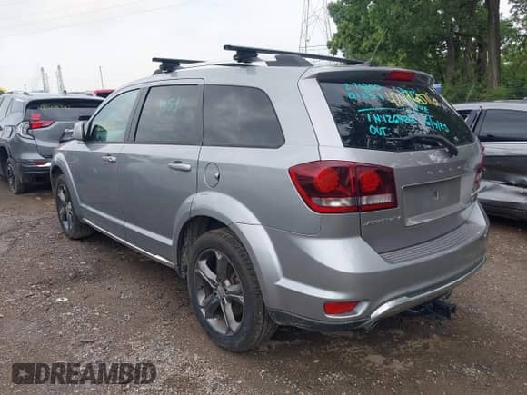 2015 Dodge Journey Crossroad with VIN 3C4PDCGG8FT632182, listed as a IAAI auction lot 42496076 with 126,426 mi miles and . Bid and sale history available at DreamBid. Image 3.