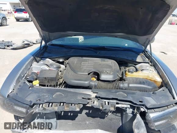 2014 Dodge Charger SE with VIN 2C3CDXBG1EH168709, listed as a IAAI auction lot 41872541 with 137,877 mi miles and . Bid and sale history available at DreamBid. Image 10.