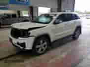 2012 Jeep Grand Cherokee Overland z VIN 1C4RJFCGXCC272414, wystawiony jako Copart lot #80581065 z przebiegiem 135 293 mil mil oraz Szkoda całkowita • Salvage title. Historia ofert i sprzedaży dostępna na DreamBid. Obrazek 1.