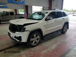 2012 Jeep Grand Cherokee Overland z VIN 1C4RJFCGXCC272414, wystawiony jako Copart lot #80581065 z przebiegiem 135 293 mil mil oraz Szkoda całkowita • Salvage title. Historia ofert i sprzedaży dostępna na DreamBid. Obrazek 1.