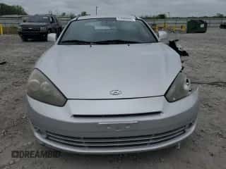 2008 Hyundai Tiburon GS с VIN KMHHM66DX8U288114, выставлен на аукционе Copart как лот 51866995 с пробегом Не указан миль и Списание • Salvage title. История ставок и продаж доступна на DreamBid. Изображение 5.