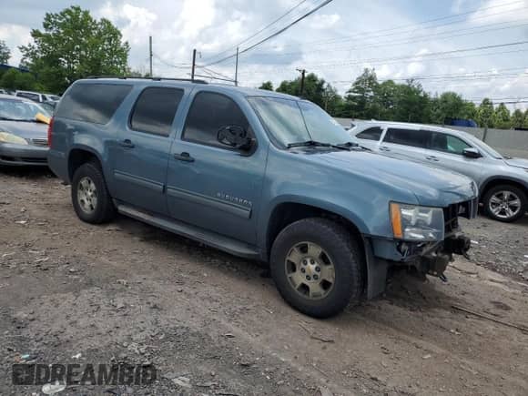 2010 Chevrolet Suburban LS с VIN 1GNUKHE33AR245179, выставлен на аукционе Copart как лот 63735545 с пробегом 176 565 миль миль и Списание • Salvage title. История ставок и продаж доступна на DreamBid. Изображение 4.