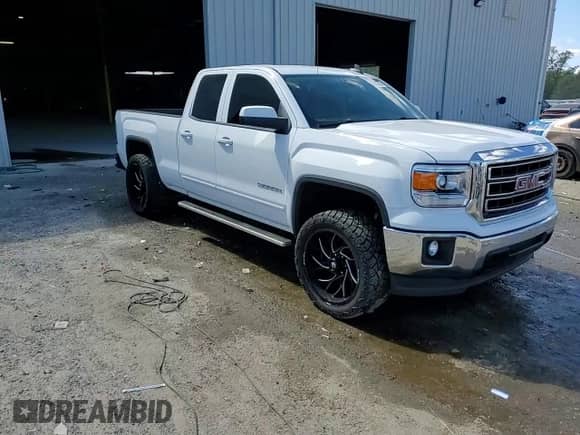 2015 GMC Sierra 1500 SLE with VIN 1GTR1UEC9FZ216965, listed as a Copart auction lot 86822795 with 110,801 mi miles and Salvage title. Bid and sale history available at DreamBid. Image 13.