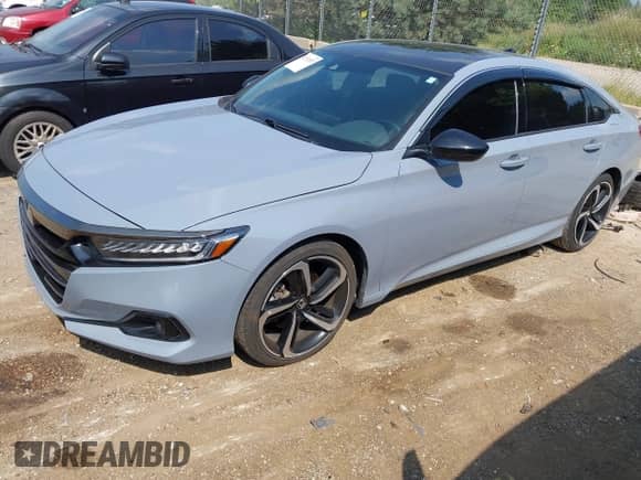 2021 Honda Accord Sport z VIN 1HGCV2F32MA013927, wystawiony jako IAAI lot #42712957 z przebiegiem 69 525 mil mil oraz . Historia ofert i sprzedaży dostępna na DreamBid. Obrazek 2.