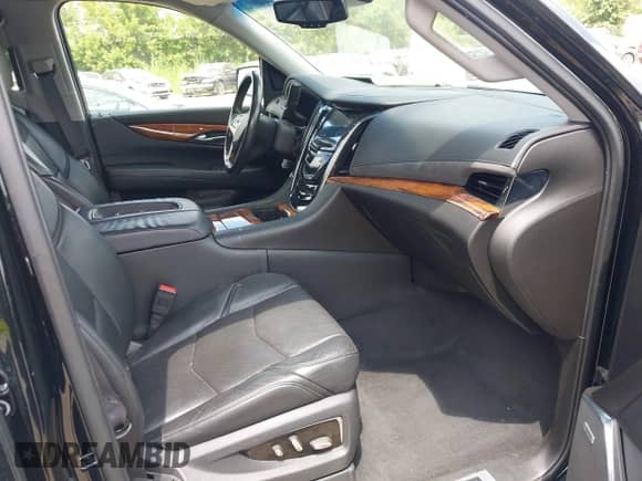 2015 Cadillac Escalade Premium z VIN 1GYS4CKJ9FR254258, wystawiony jako IAAI lot #42574409 z przebiegiem 129 511 mil mil oraz . Historia ofert i sprzedaży dostępna na DreamBid. Obrazek 5.