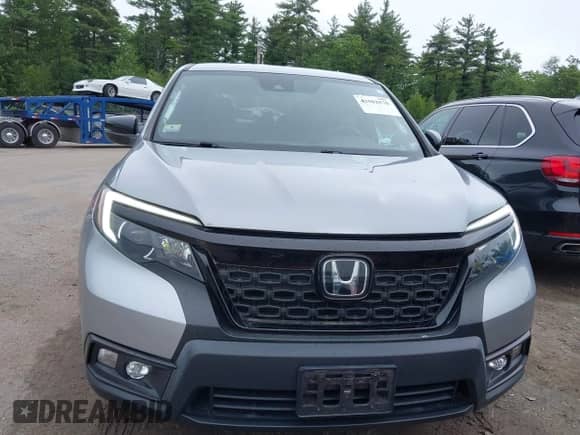 2019 Honda Passport EX-L with VIN 5FNYF8H54KB007201, listed as a IAAI auction lot 42502570 with 55,560 mi miles and . Bid and sale history available at DreamBid. Image 6.