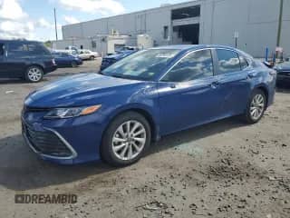 2024 Toyota Camry LE with VIN 4T1C11AK6RU229882, listed as a Copart auction lot 80299135 with 28,863 mi miles and Salvage title. Bid and sale history available at DreamBid. Image 1.