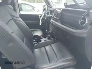 2024 Jeep Wrangler Sahara with VIN 1C4RJXP61RW193907, listed as a IAAI auction lot 42591776 with 11,874 mi miles and . Bid and sale history available at DreamBid. Image 5.