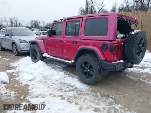 2022 Jeep Wrangler Unlimited Sahara with VIN 1C4HJXEG8NW124021, listed as a IAAI auction lot 41269073 with 33,346 mi miles and . Bid and sale history available at DreamBid. Image 3.