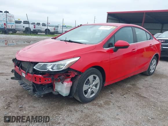 2018 Chevrolet Cruze LS z VIN 1G1BC5SMXJ7100220, wystawiony jako IAAI lot #42800342 z przebiegiem 69 739 mil mil oraz . Historia ofert i sprzedaży dostępna na DreamBid. Obrazek 2.