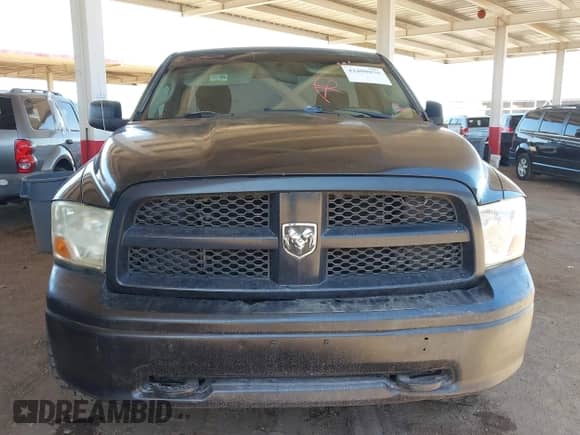 2012 Ram 1500 z VIN 3C6JD7DPXCG259725, wystawiony jako IAAI lot #42409076 z przebiegiem 186 458 mil mil oraz . Historia ofert i sprzedaży dostępna na DreamBid. Obrazek 12.
