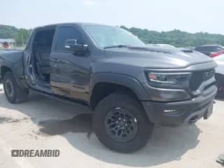 2021 Ram 1500 TRX with VIN 1C6SRFU99MN830292, listed as a IAAI auction lot 42449971 with 48,931 mi miles and . Bid and sale history available at DreamBid. Image 1.