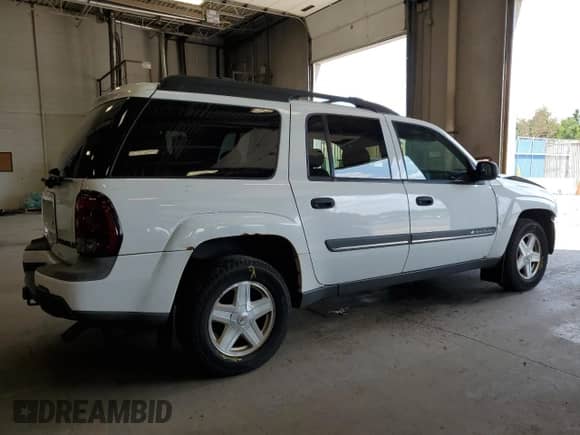 2002 Chevrolet TrailBlazer EXT LT with VIN 1GNET16S026109559, listed as a Copart auction lot 63697695 with 148,151 mi miles and Salvage title. Bid and sale history available at DreamBid. Image 3.