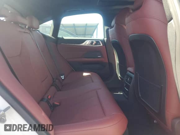 2022 BMW i4 eDrive40 with VIN WBY73AW01NFM83830, listed as a Copart auction lot 67808055 with 19,938 mi miles and Salvage title. Bid and sale history available at DreamBid. Image 10.