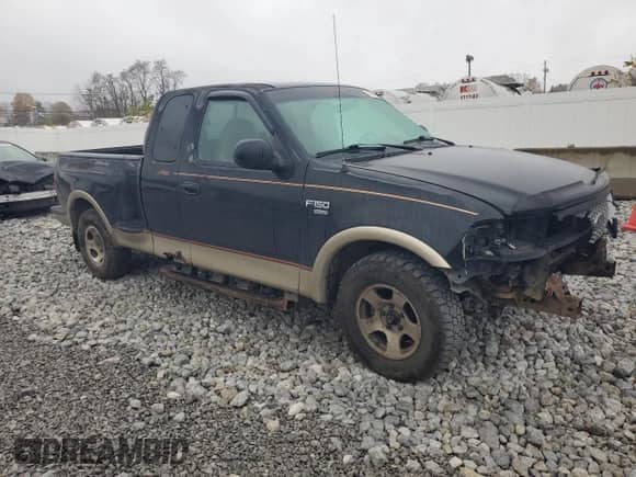 1999 Ford F-150 XL z VIN 2FTRX07W0XCA56178, wystawiony jako Copart lot #79064324 z przebiegiem 188 479 mil mil oraz Szkoda całkowita • Salvage title. Historia ofert i sprzedaży dostępna na DreamBid. Obrazek 4.