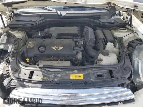 2013 MINI Hardtop with VIN WMWSU3C59DT686532, listed as a Copart auction lot 60481655 with 78,711 mi miles and Salvage title. Bid and sale history available at DreamBid. Image 12.