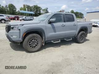 2023 Nissan Frontier SV with VIN 1N6ED1EK4PN663365, listed as a Copart auction lot 70290965 with 63,644 mi miles and Salvage title. Bid and sale history available at DreamBid. Image 1.