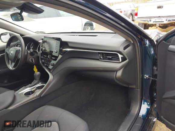 2021 Toyota Camry LE with VIN 4T1C11AK8MU548158, listed as a IAAI auction lot 43333222 with 34,824 mi miles and . Bid and sale history available at DreamBid. Image 5.