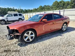 2013 Dodge Charger RT Max with VIN 2C3CDXCT5DH570629, listed as a Copart auction lot 70319225 with 196,126 mi miles and Salvage title. Bid and sale history available at DreamBid. Image 1.