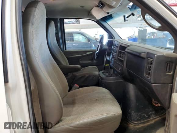 2012 Chevrolet Express Passenger 1LT с VIN 1GAZG1FG6C1139148, выставлен на аукционе Copart как лот 54662595 с пробегом 449 617 миль миль и Списание • Salvage title. История ставок и продаж доступна на DreamBid. Изображение 11.