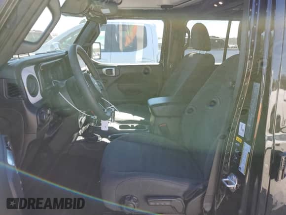 2024 Jeep Wrangler Willys с VIN 1C4PJXDN8RW159269, выставлен на аукционе Copart как лот 76944844 с пробегом 5 974 миль миль и Списание • Salvage title. История ставок и продаж доступна на DreamBid. Изображение 7.