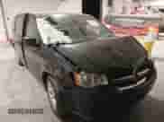 2016 Dodge Grand Caravan American Value with VIN 2C4RDGBG7GR325341, listed as a IAAI auction lot 42919035 with 156,562 mi miles and . Bid and sale history available at DreamBid. Image 1.