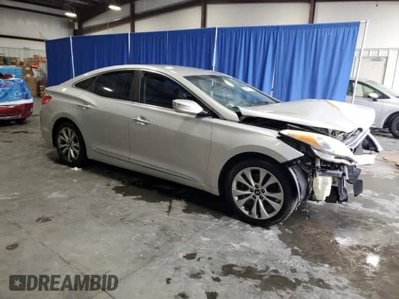 2014 Hyundai Azera с VIN KMHFG4JG0EA355997, выставлен на аукционе Copart как лот 59851335 с пробегом Не указан миль и Списание • Salvage title. История ставок и продаж доступна на DreamBid. Изображение 4.
