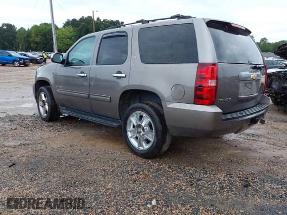 2013 Chevrolet Tahoe LT with VIN 1GNSKBE04DR339098, listed as a IAAI auction lot 42989580 with 220,959 mi miles and . Bid and sale history available at DreamBid. Image 3.