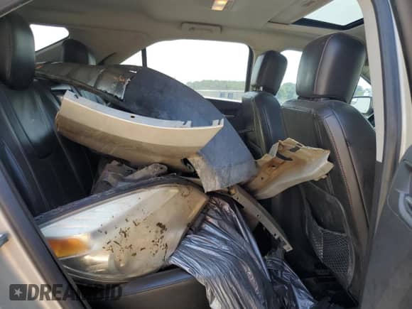 2013 Chevrolet Equinox LTZ z VIN 2GNFLFE37D6230663, wystawiony jako Copart lot #64645055 z przebiegiem 176 296 mil mil oraz Szkoda całkowita • Salvage title. Historia ofert i sprzedaży dostępna na DreamBid. Obrazek 11.