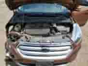 2017 Ford Escape Titanium with VIN 1FMCU0J9XHUA00876, listed as a Copart auction lot 59203535 with 125,942 mi miles and Salvage title. Bid and sale history available at DreamBid. Image 12.