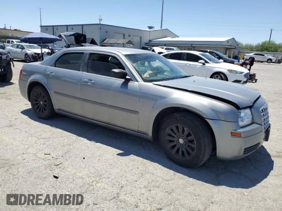 2006 Chrysler 300 with VIN 2C3KA43R86H169845, listed as a Copart auction lot 61271765 with 183,366 mi miles and Salvage title. Bid and sale history available at DreamBid. Image 4.