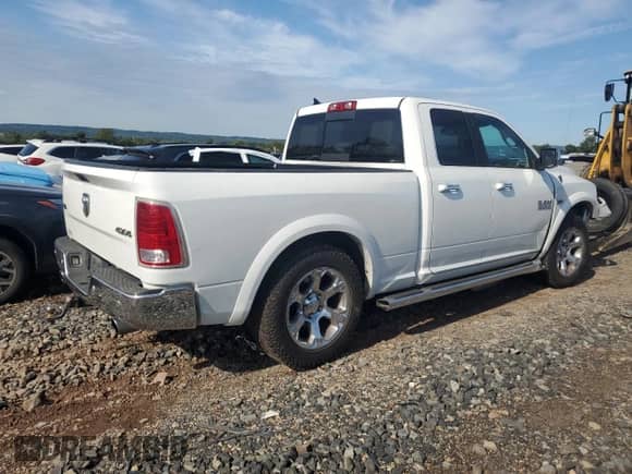 2014 Ram 1500 Laramie с VIN 1C6RR7JT4ES390876, выставлен на аукционе Copart как лот 80023095 с пробегом 173 702 миль миль и Списание • Salvage title. История ставок и продаж доступна на DreamBid. Изображение 3.