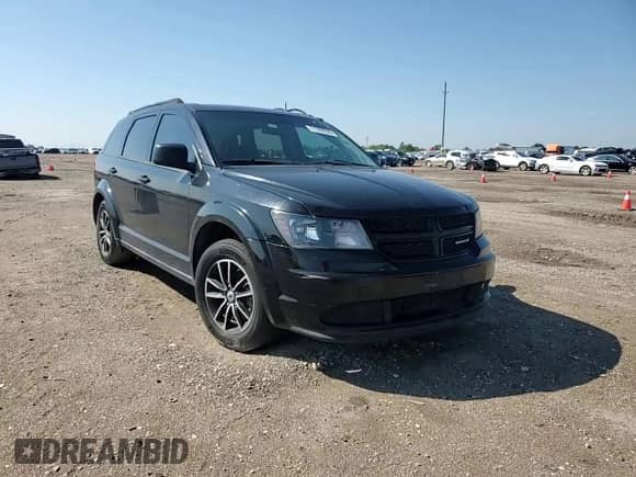 2018 Dodge Journey SE with VIN 3C4PDCAB1JT152331, listed as a Copart auction lot 71960535 with 124,538 mi miles and Salvage title. Bid and sale history available at DreamBid. Image 14.