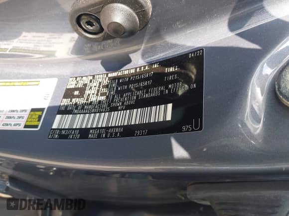 2022 Toyota Corolla Cross L with VIN 7MUAAAAG5NV014635, listed as a IAAI auction lot 43039006 with 19,099 mi miles and . Bid and sale history available at DreamBid. Image 9.