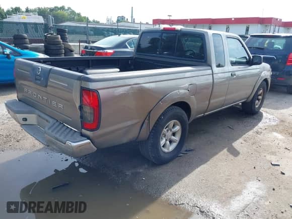 2004 Nissan Frontier XE with VIN 1N6DD26T94C410056, listed as a IAAI auction lot 43003095 with 215,814 mi miles and . Bid and sale history available at DreamBid. Image 4.
