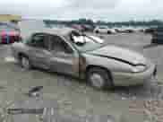 1999 Chevrolet Lumina with VIN 2G1WL52M1X9238639, listed as a Copart auction lot 63656715 with 213,285 mi miles and Salvage title. Bid and sale history available at DreamBid. Image 4.