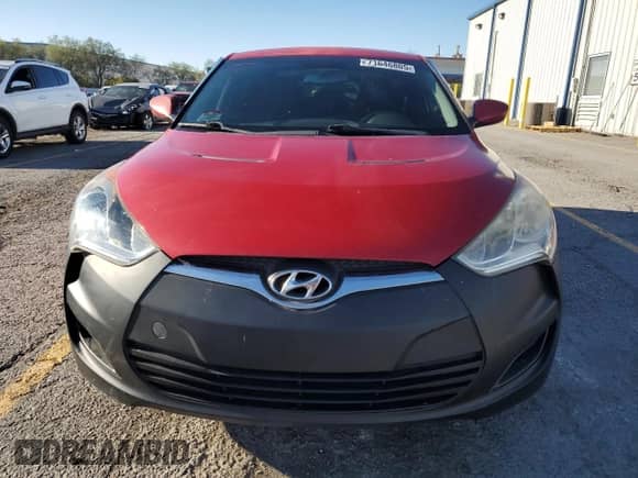 2013 Hyundai Veloster w/Black Int с VIN KMHTC6AD0DU166697, выставлен на аукционе Copart как лот 71646805 с пробегом 158 640 миль миль и Списание • Salvage title. История ставок и продаж доступна на DreamBid. Изображение 5.