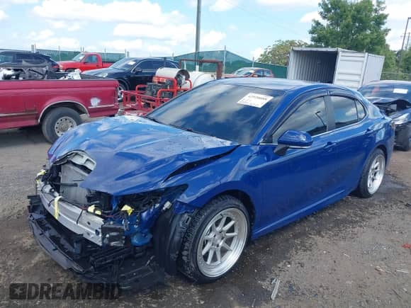 2023 Toyota Camry SE z VIN 4T1G11AK4PU102689, wystawiony jako IAAI lot #42928088 z przebiegiem 38 369 mil mil oraz . Historia ofert i sprzedaży dostępna na DreamBid. Obrazek 19.