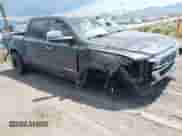 2021 Ram 1500 Laramie z VIN 1C6SRFJT1MN805824, wystawiony jako IAAI lot #42407592 z przebiegiem Nie podano mil oraz . Historia ofert i sprzedaży dostępna na DreamBid. Obrazek 1.