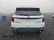 2023 Honda Passport EX-L z VIN 5FNYF8H50PB038291, wystawiony jako Copart lot #90505985 z przebiegiem 16 211 mil mil oraz Szkoda całkowita • Salvage title. Historia ofert i sprzedaży dostępna na DreamBid. Obrazek 6.