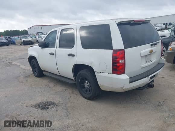 2013 Chevrolet Tahoe Commercial with VIN 1GNLC2E02DR311625, listed as a IAAI auction lot 42727642 with 158,335 mi miles and . Bid and sale history available at DreamBid. Image 3.