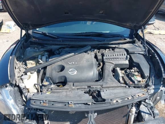 2014 Nissan Maxima S z VIN 1N4AA5AP4EC498516, wystawiony jako IAAI lot #43125499 z przebiegiem 159 797 mil mil oraz . Historia ofert i sprzedaży dostępna na DreamBid. Obrazek 10.