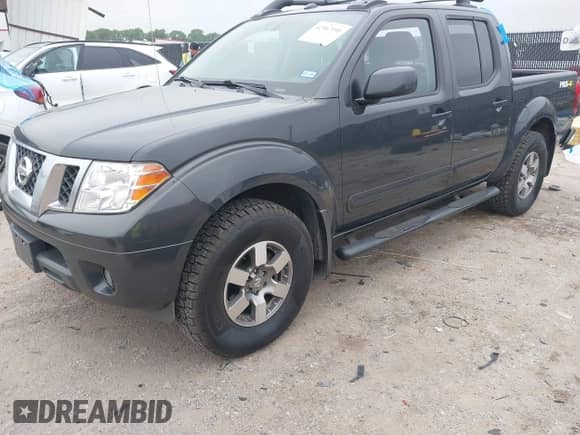 2013 Nissan Frontier SV with VIN 1N6AD0EVXDN740402, listed as a IAAI auction lot 42367191 with 101,366 mi miles and . Bid and sale history available at DreamBid. Image 2.
