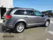 2015 Dodge Journey SXT z VIN 3C4PDDBG0FT569382, wystawiony jako Copart lot #71550295 z przebiegiem 154 117 mil mil oraz Szkoda całkowita • Salvage title. Historia ofert i sprzedaży dostępna na DreamBid. Obrazek 3.