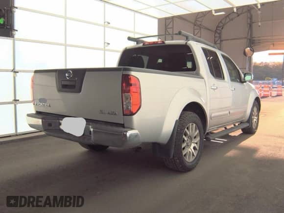 2011 Nissan Frontier Pro-4X with VIN 1N6AD0EV5BC402964, listed as a Copart auction lot 85243035 with 234,460 mi miles and Clean title. Bid and sale history available at DreamBid. Image 4.